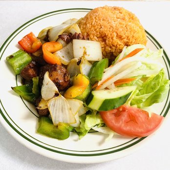 Stir-Fried Meat with Peppers Onions and Rice